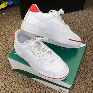 Puma sneakers size YOUTH 7C- 8 in woman’s sizing.